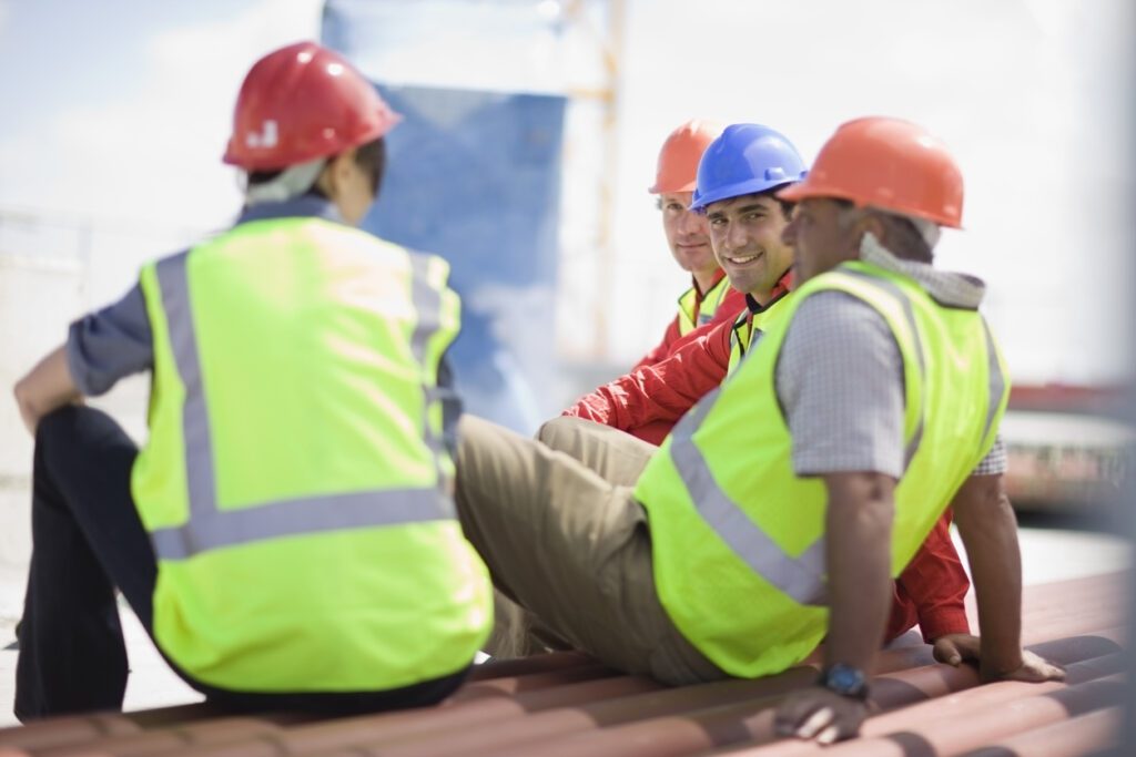 Building workers having a rest on the job site