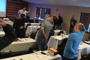 Peak Ergonomics safety seminar attendees stretch